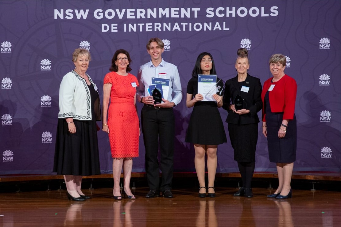 Group photo of student winners and Department of Education officials